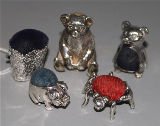 Five miniature silver novelty pin cushions, including two bears, a pig, a spider and a basket, largest 1.5in.
